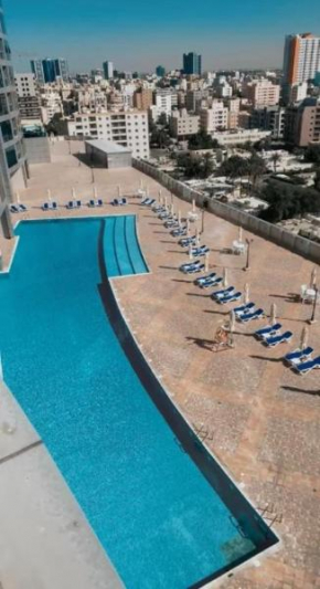 Luxury Corniche Residence 2 BHK pool gym wifi sea front